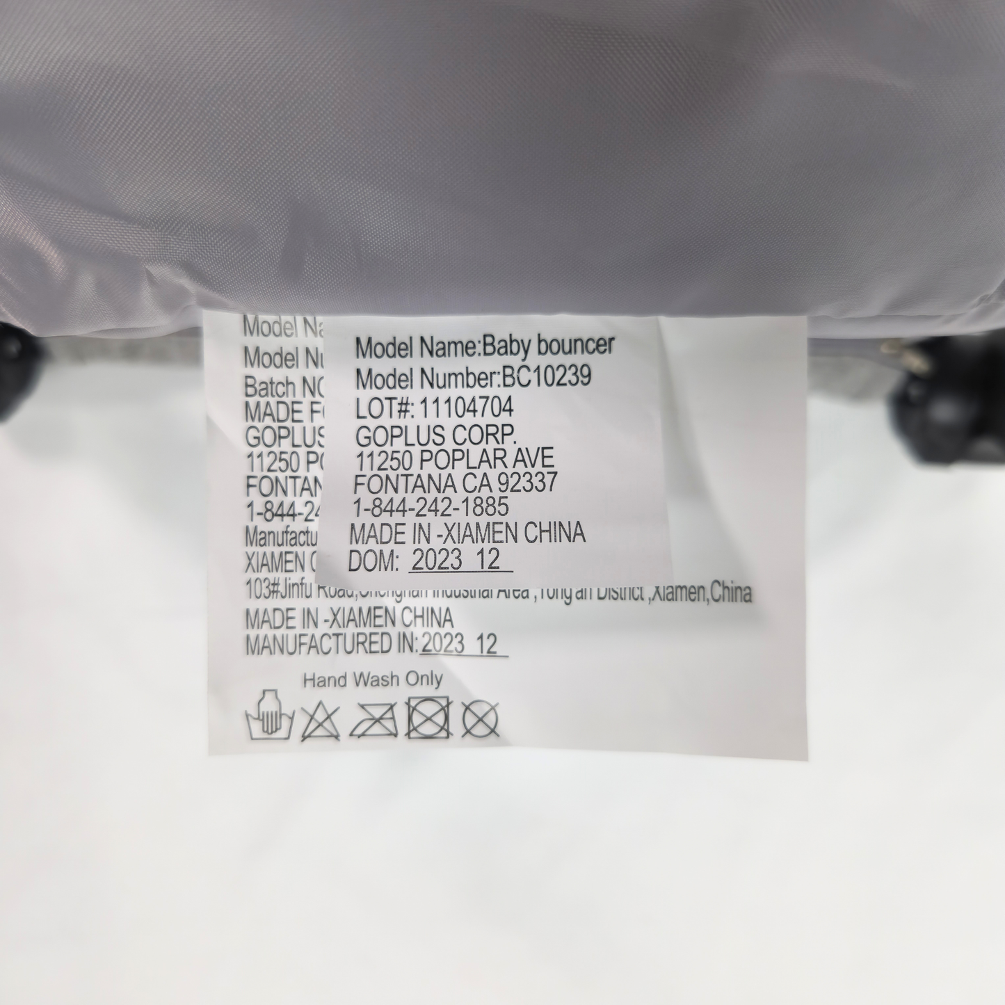 Babyjoy foldable baby bouncer stationary seat grey label showing date of manufacture