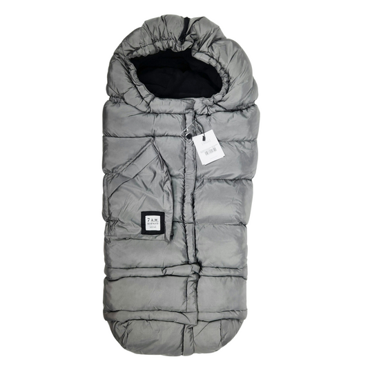 A metallic grey 7AM Enfant stroller blanket with a visible brand tag