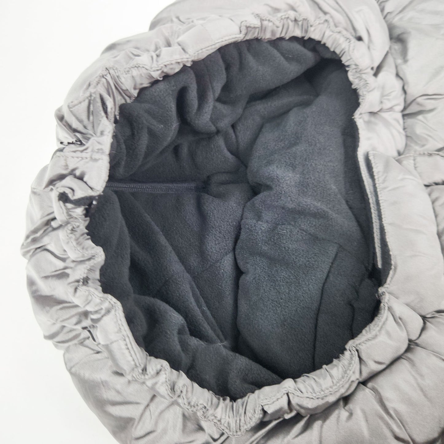 A metallic grey 7AM Enfant stroller blanket hood
