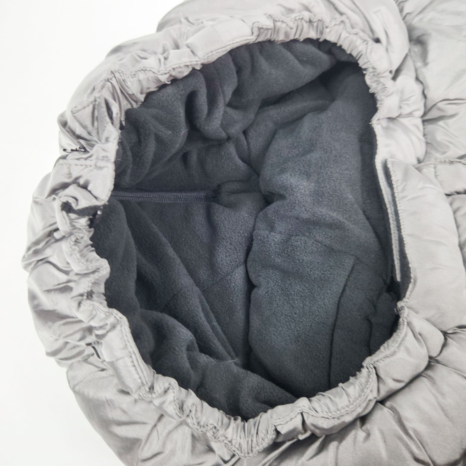 A metallic grey 7AM Enfant stroller blanket hood