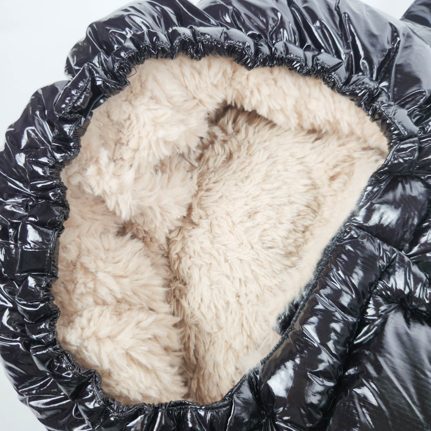 7AM Enfant Blanket 212 Evolution Black Polar footmuff with fleece lining close up view