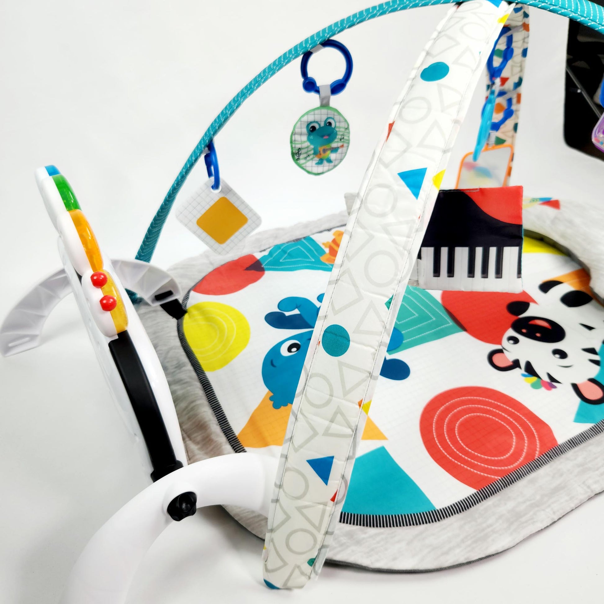 Baby Einstein 4 in 1 Kickin Tunes music activity gym play mat with piano, hanging toys and play mat assembled view
