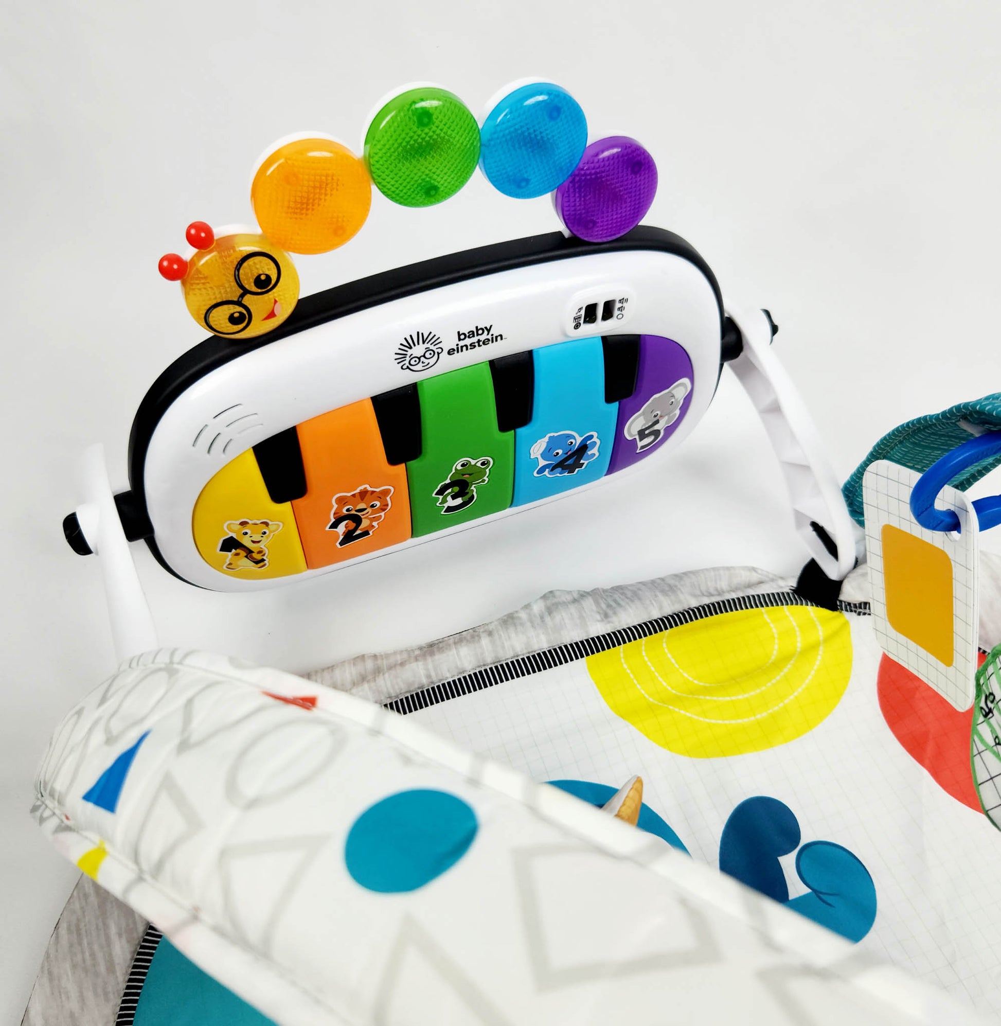 Baby Einstein 4 in 1 Kickin Tunes music activity gym play mat with piano, hanging toys and play mat assembled view