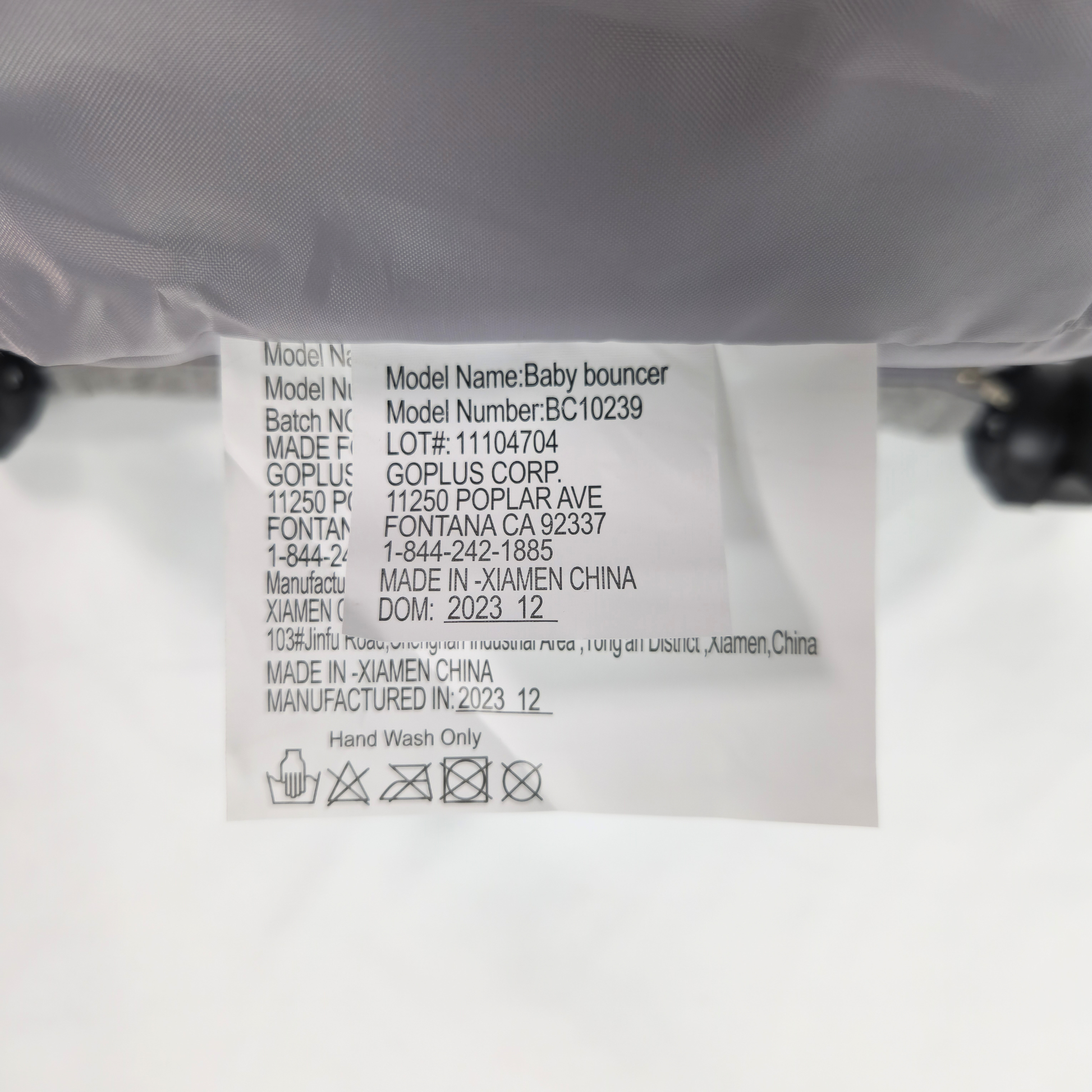 Babyjoy foldable baby bouncer stationary seat grey label showing date of manufacture