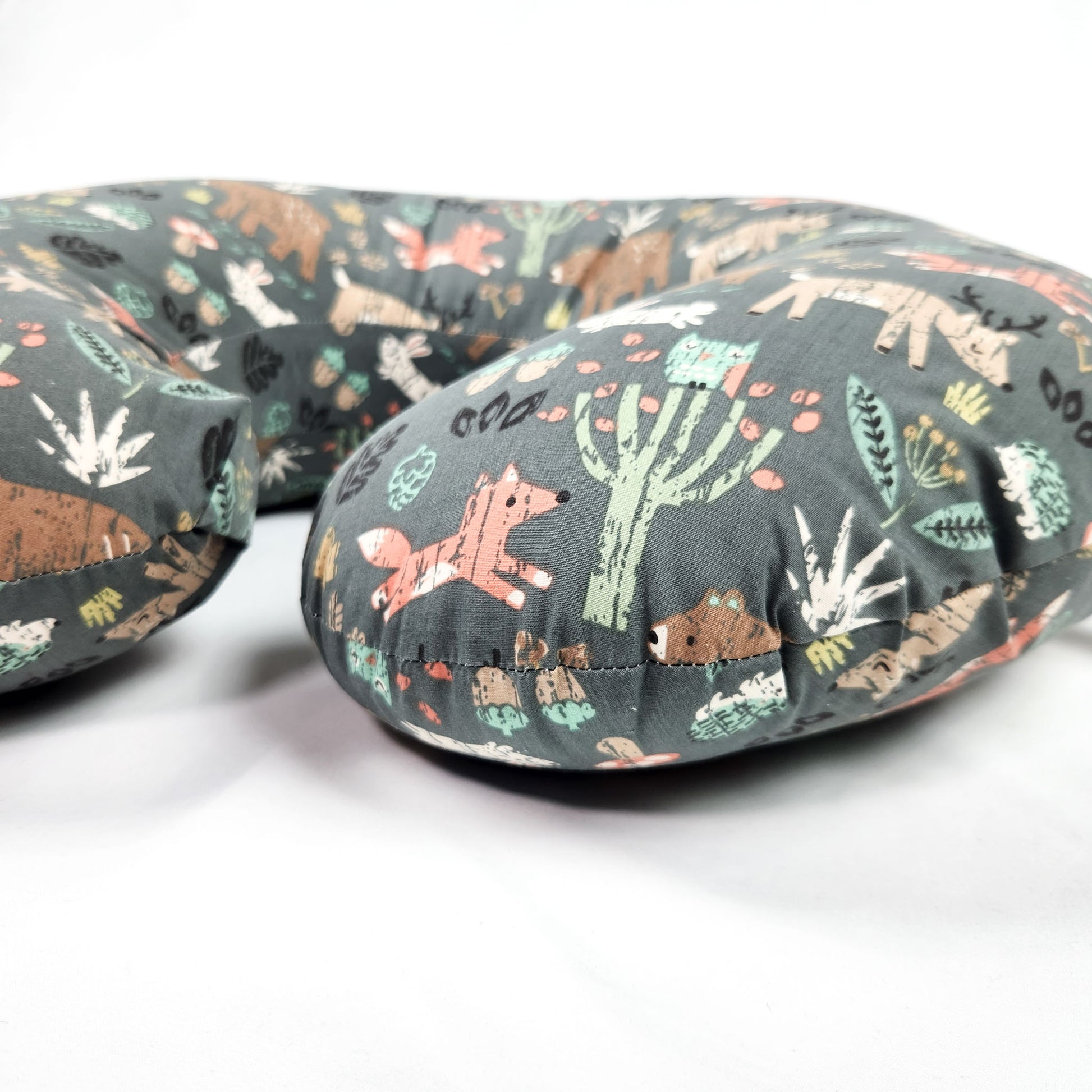 Boppy Original Nursing Pillow green forest animals breastfeeding support pillow close up view