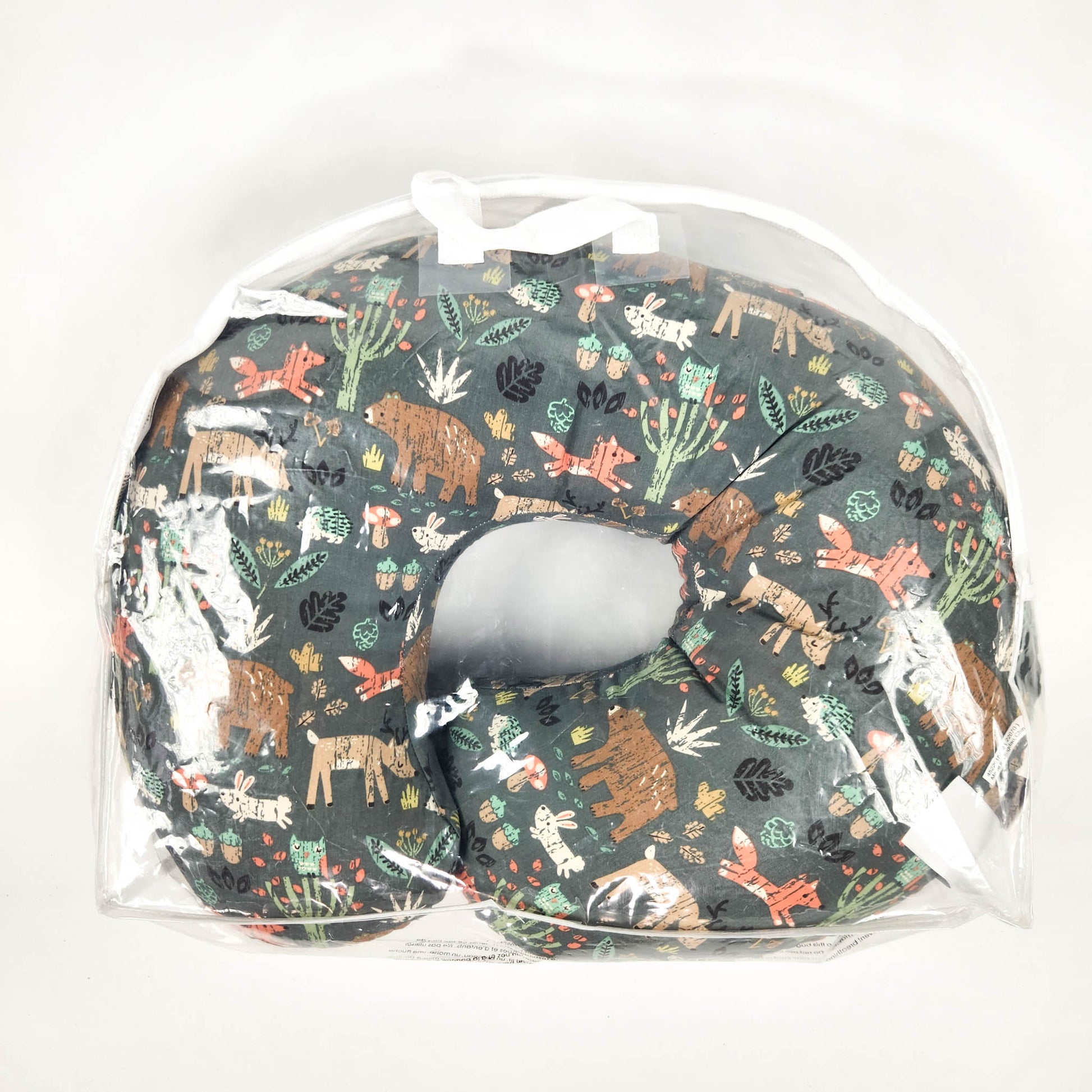 Boppy Original Nursing Pillow green forest animals breastfeeding support pillow inside the packaging travel storage bag