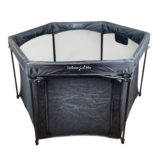 Dream On Me Onyx playpen black front view showing mesh sides and zippered door panel