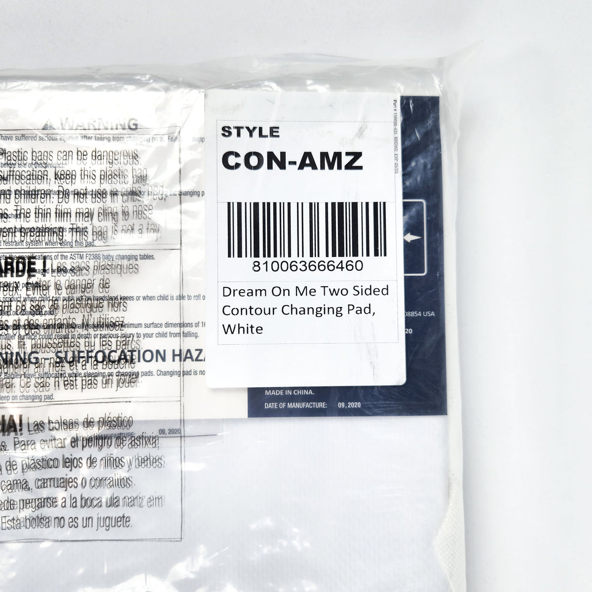 Dream On Me two sided contour changing pad in packaging back side showing date of manufacture