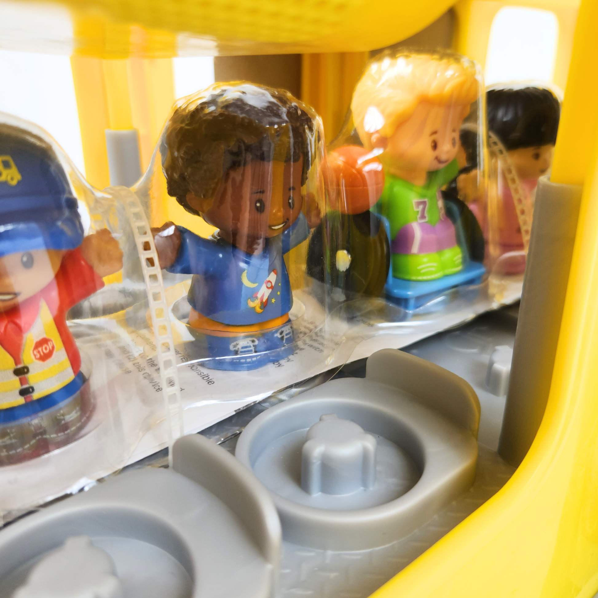 Fisher Price Little People Big Yellow School Bus in packaging showing little people characters