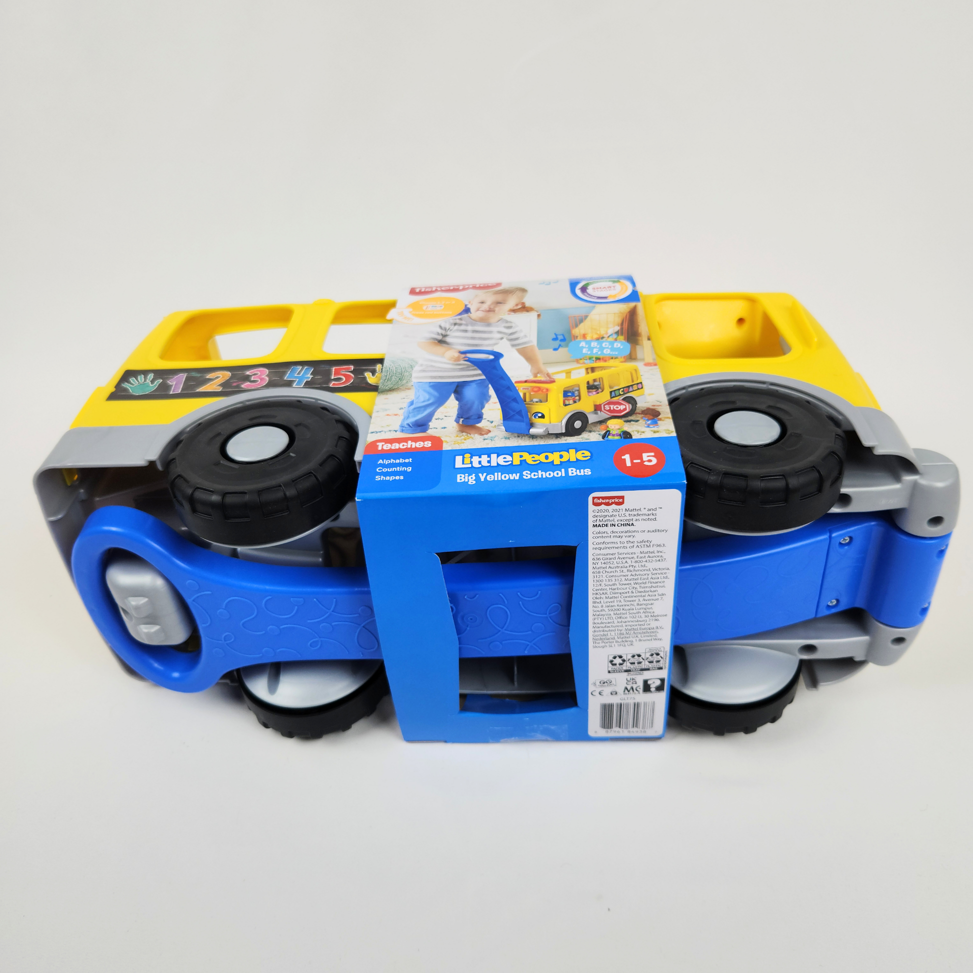 Fisher Price Little People Big Yellow School Bus in packaging bottom view showing the pull handle