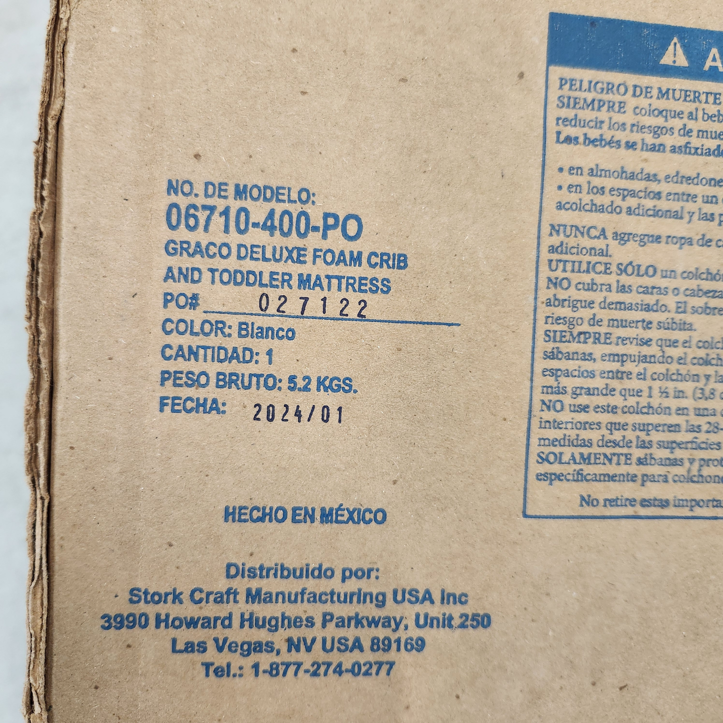 Graco Crib and Toddler Mattress-In-A-Box showing its shipping box close up detail showing date of manufacture