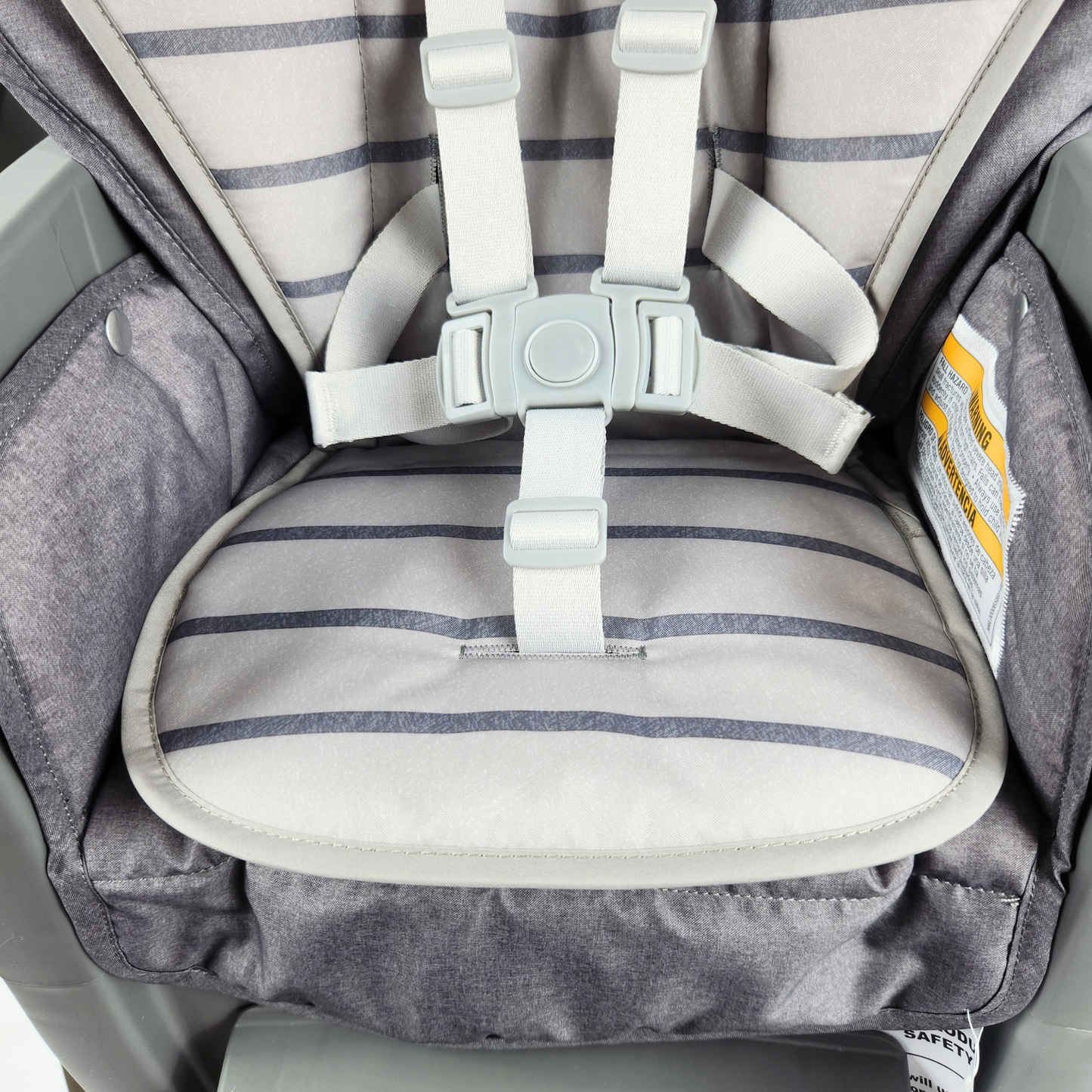 Graco Table2Table Premier Fold 7-in-1 highchair in Maison close up view of padded seat and straps