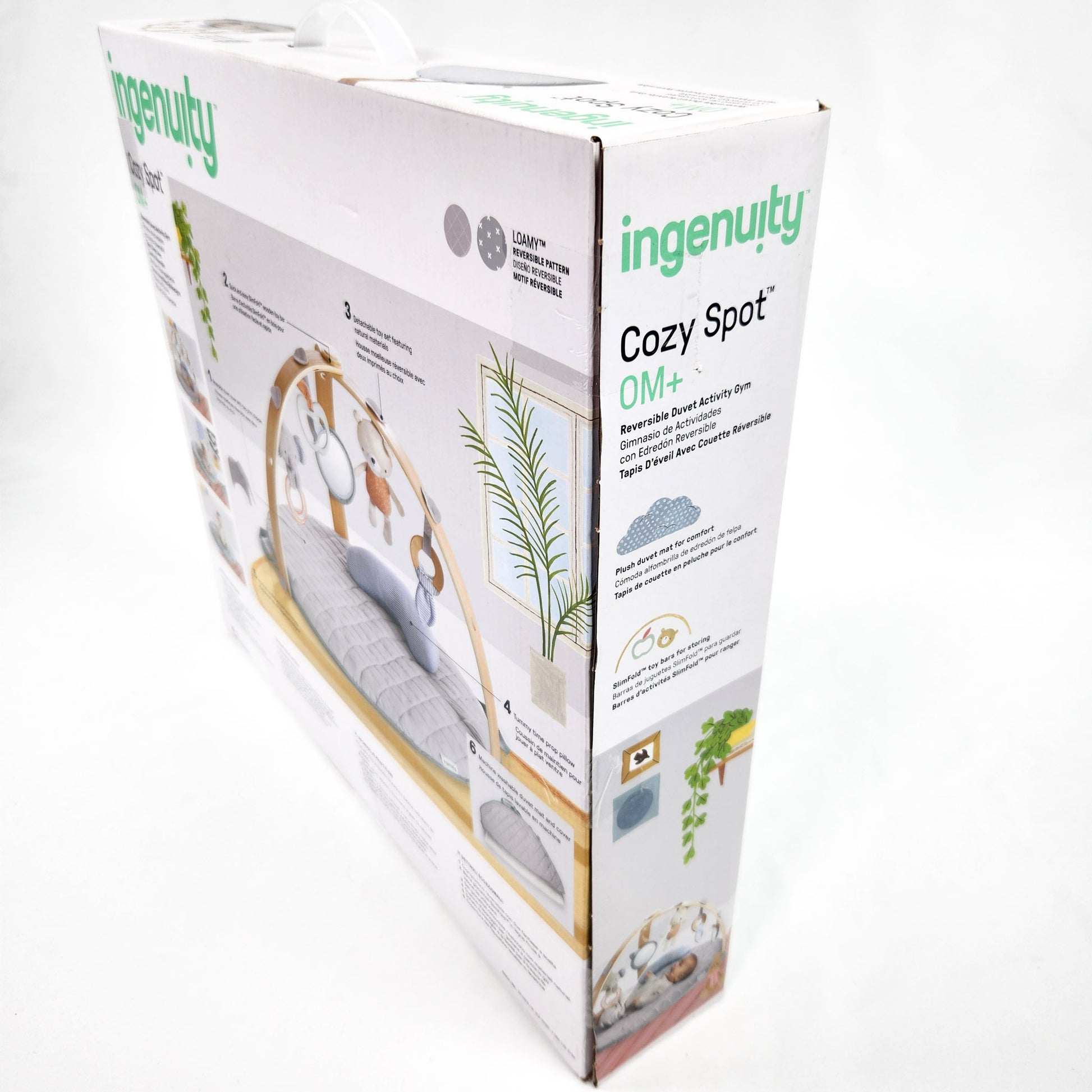 Ingenuity Cozy Spot reversible duvet activity gym in box back side of packaging box