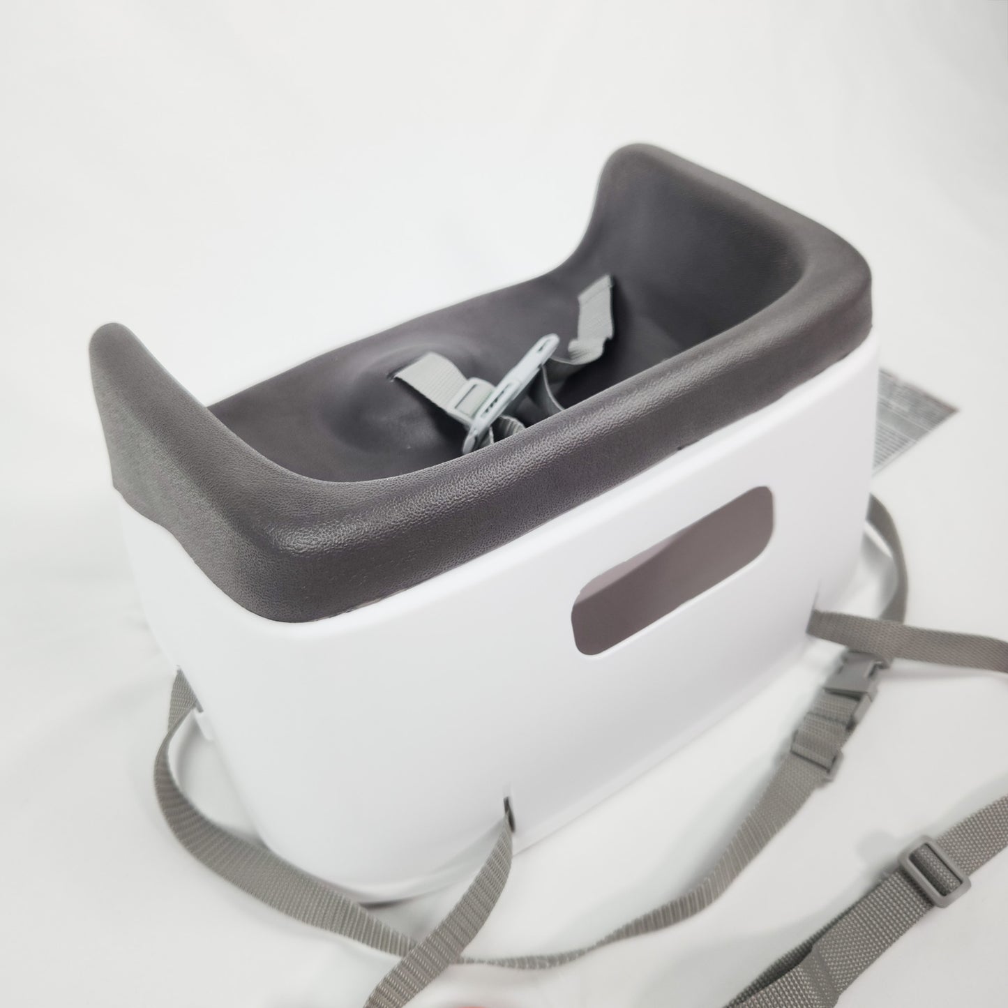 Ingenuity SmartClean toddler booster seat slate showing seat base and adjustable safety harness back side view
