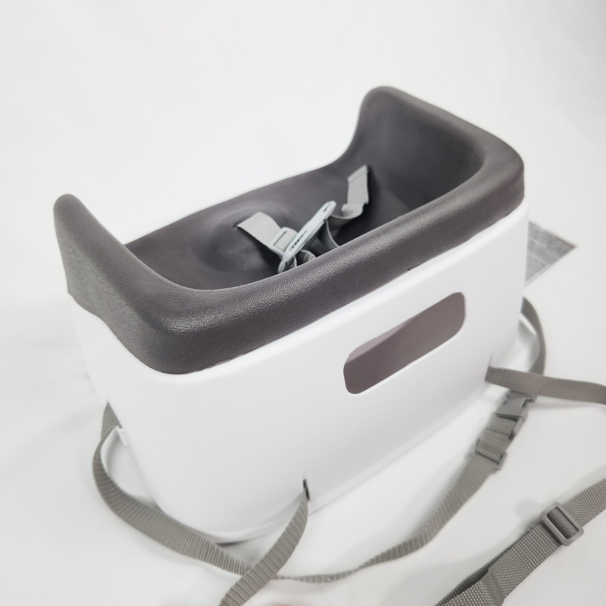 Ingenuity SmartClean toddler booster seat slate showing seat base and adjustable safety harness back side view