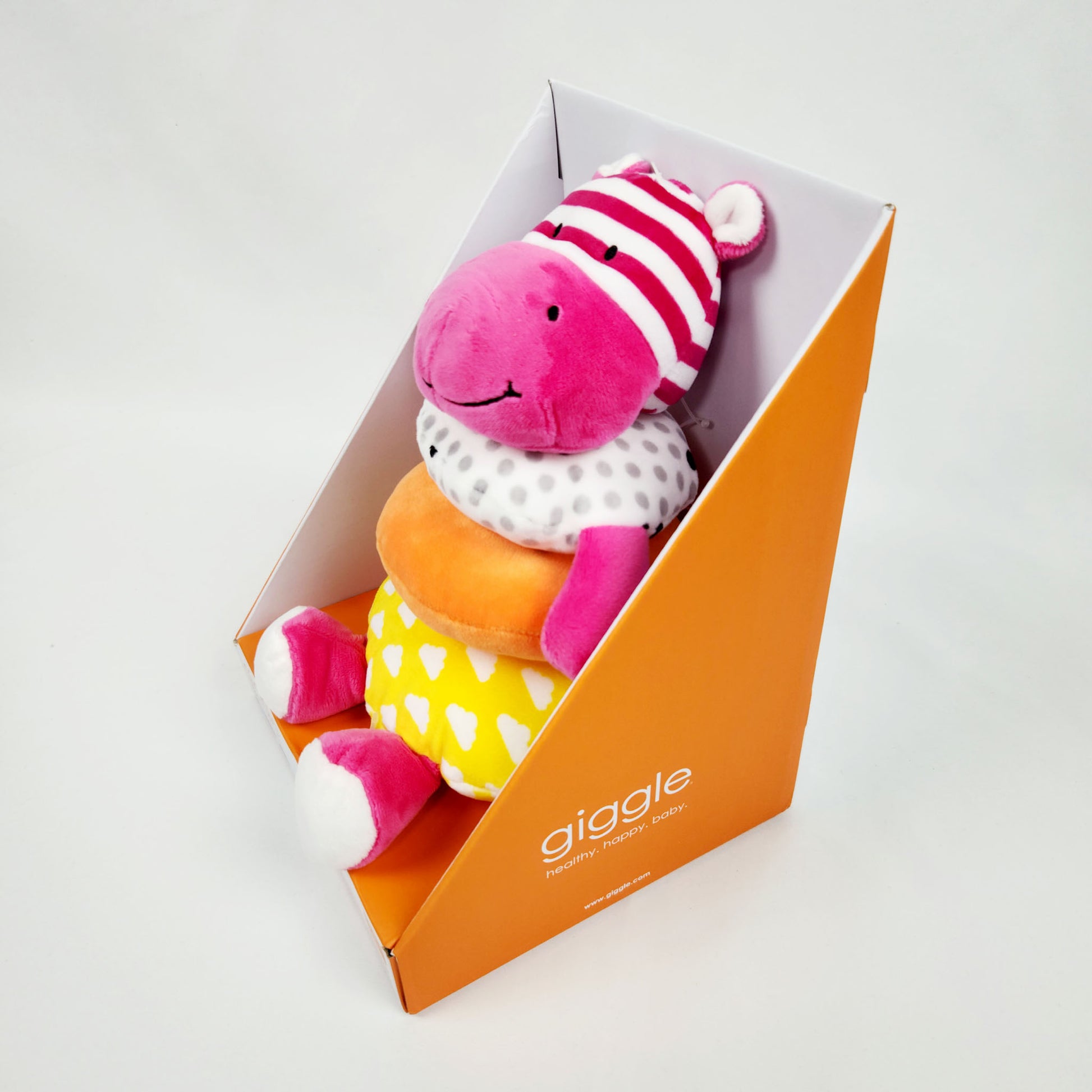Giggle soft stacker baby toy pink hippo plush with colorful stacking rings in packaging