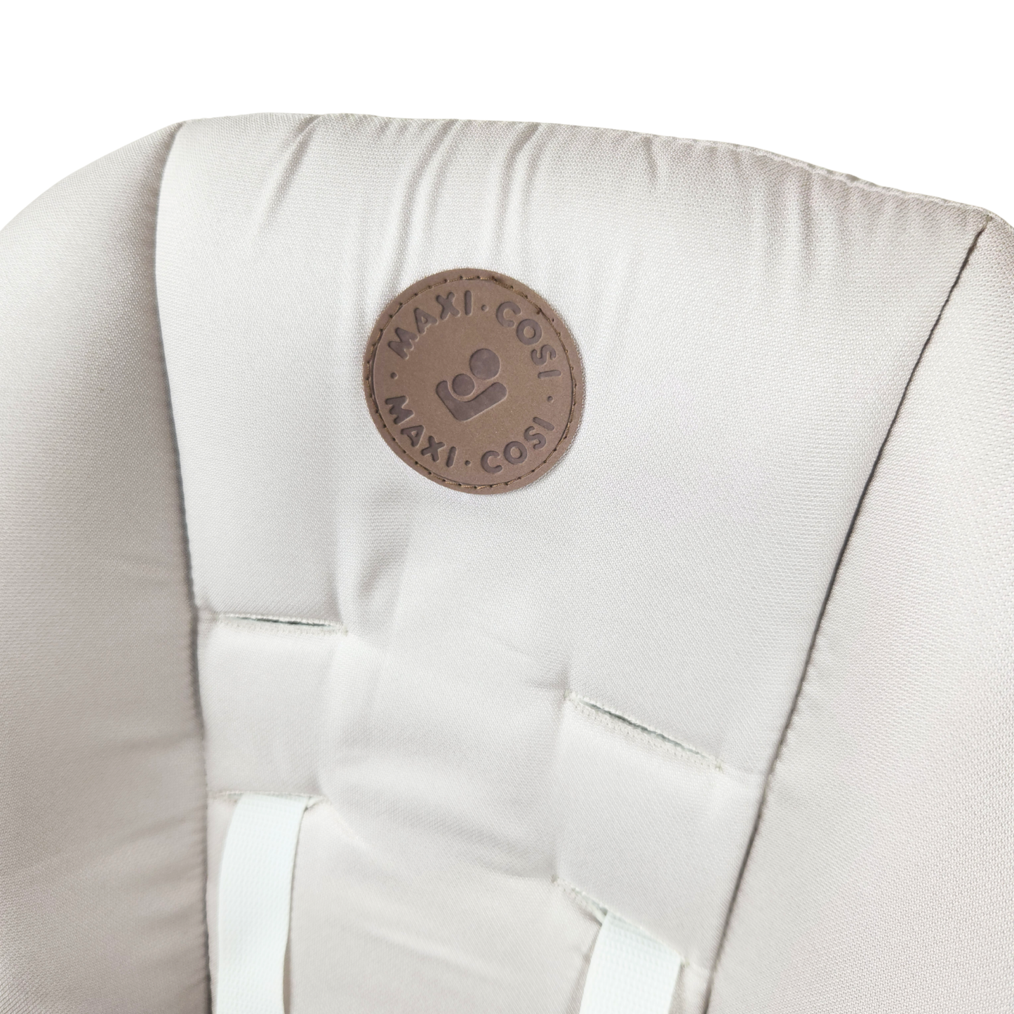Maxi Cosi Minla high chair Horizon Sand showing brand logo