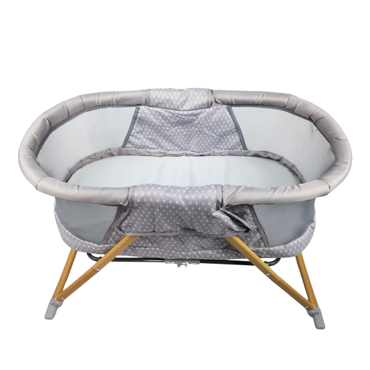 Safety 1st Amherst bassinet Stardust front view showing mesh sides, padded edges and wooden legs