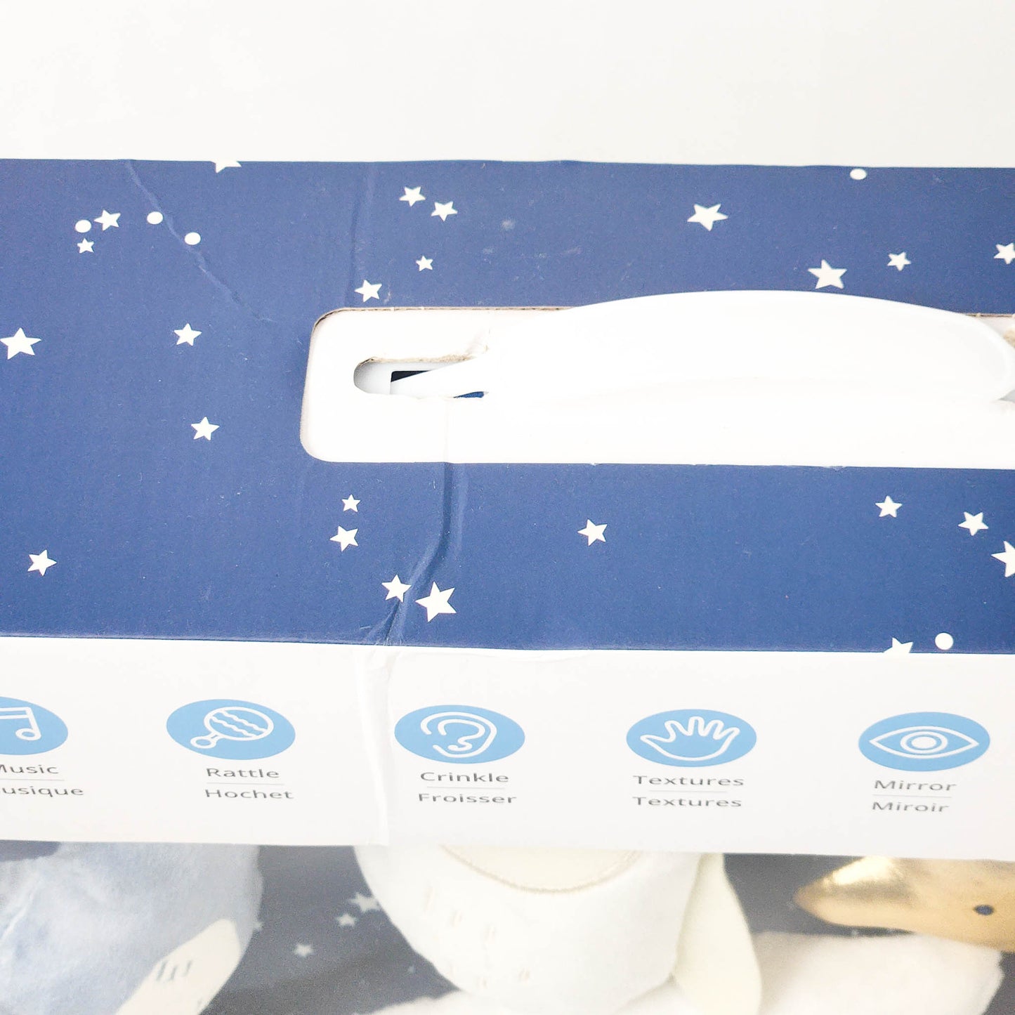 Skip Hop Celestial Dreams activity gym in box top side close up view